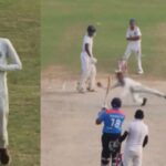 An old man takes a flying catch during a cricket match.